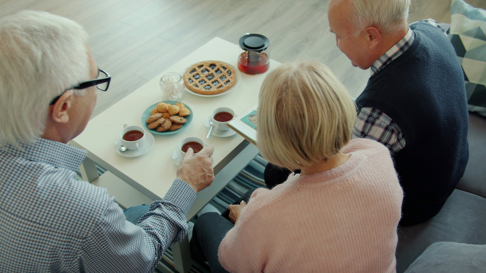 Friends sharing tea and pie